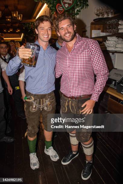 Patrick Schwarzenegger and Christopher Schwarzenegger during the 187th Oktoberfest at Theresienwiese on September 24, 2022 in Munich, Germany.