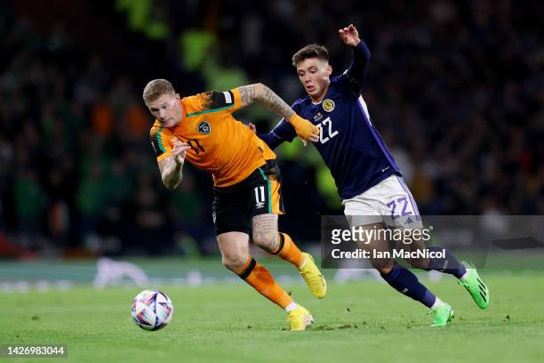James McClean of Republic of Ireland is challenged by Aaron Hickey of Scotland during the UEFA Nations League League B Group 1 match between Scotland...
