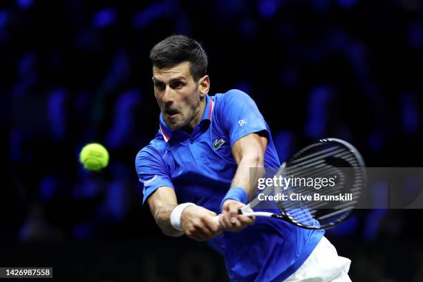 Novak Djokovic of Team Europe plays a backhand shot in the match between Frances Tiafoe of Team World and Novak Djokovic of Team Europe during Day...