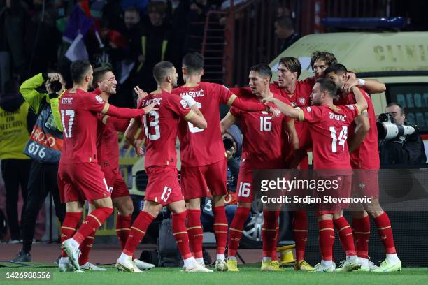 Aleksandar Mitrovic of Serbia celebrates with teammates after scoring their team's second goal during the UEFA Nations League League B Group 4 match...