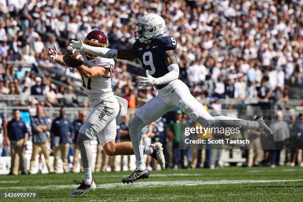 Cornerback Joey Porter Jr. #9 of the Penn State Nittany Lions breaks up a pass intended for wide receiver Finn Hogan of the Central Michigan...