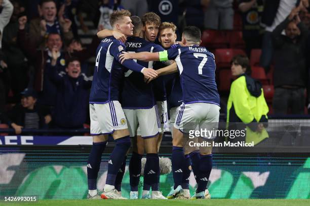 Jack Hendry of Scotland celebrates scoring their side's first goal with teammates during the UEFA Nations League League B Group 1 match between...