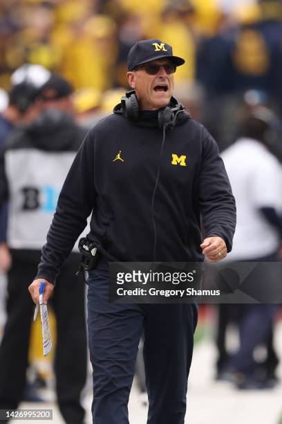 Head coach Jim Harbaugh looks on in the first half while playing the Maryland Terrapins at Michigan Stadium on September 24, 2022 in Ann Arbor,...