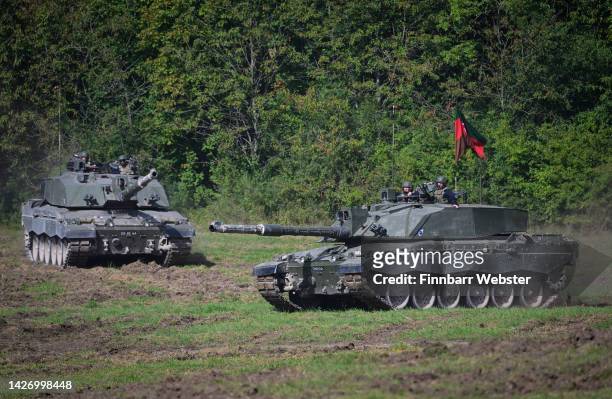 Challenger 2 main battle tanks are displayed for the families watching The Royal Tank Regiment Regimental Parade, on September 24, 2022 in Bulford,...