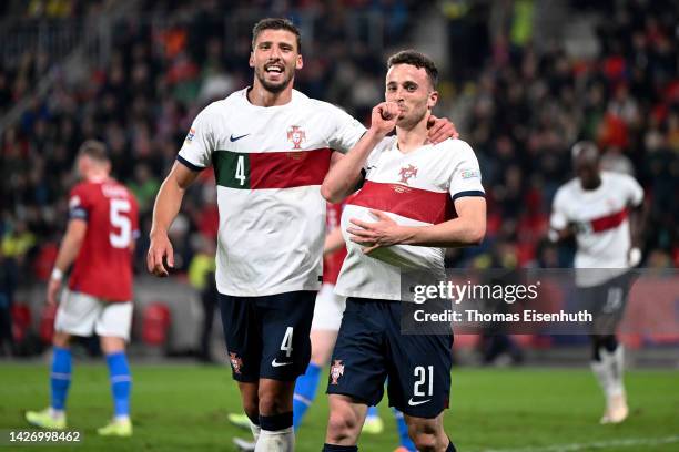 Diogo Jota of Portugal celebrates scoring their side's fourth goal with teammate Ruben Dias during the UEFA Nations League League A Group 2 match...