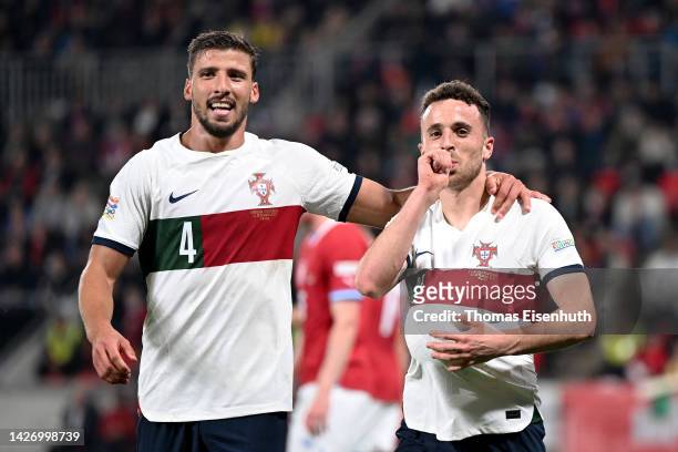 Diogo Jota of Portugal celebrates scoring their side's fourth goal with teammate Ruben Dias during the UEFA Nations League League A Group 2 match...