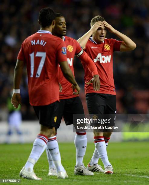 Tom Cleverley of Manchester United reacts during the Barclays Premier League match between Wigan Athletic and Manchester United at DW Stadium on...