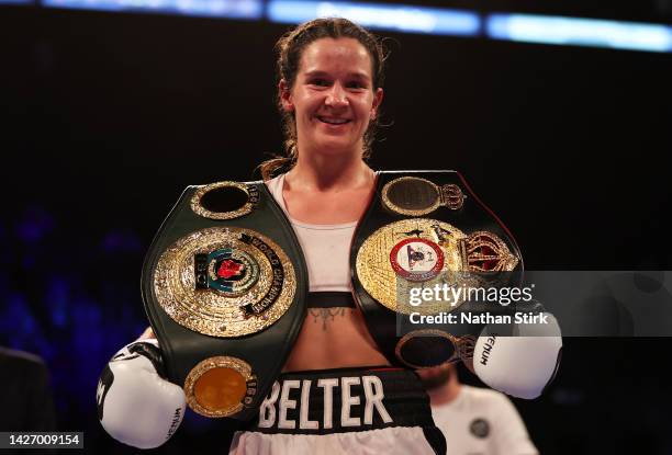 Terri Harper celebrates with the WBA and IBO World Super Welterweight Title belts after defeating Hannah Rankin in the WBA and IBO World Super...