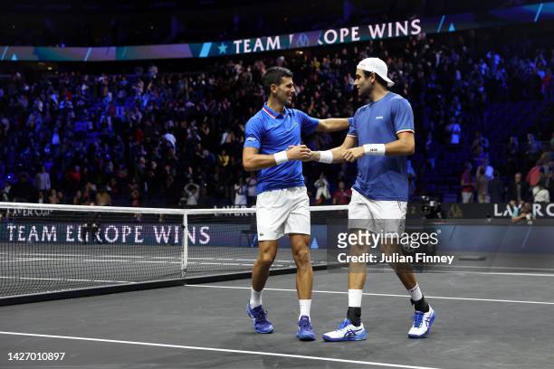 Novak Djokovic and Matteo Berrettini of Team Europe celebrate their victory in the doubles match between Novak Djokovic and Matteo Berrettini of Team...