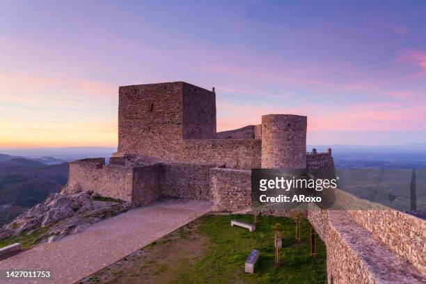 amazing sunset at castle marvao, a small picturesque village in the alentejo, portugal. panoramic view landscape. this landmark is an amazing travel destination. - マルバオ ストックフォトと画像