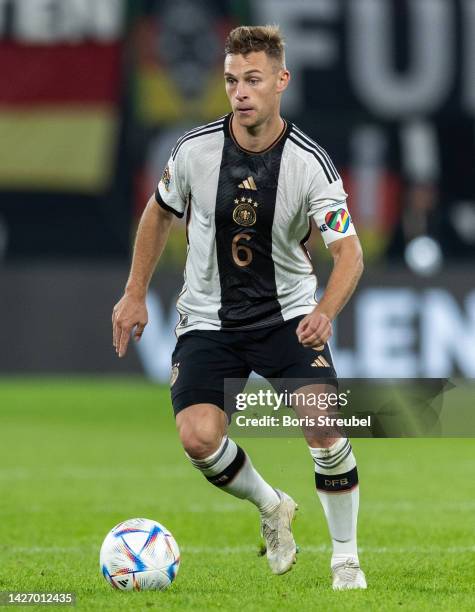 Joshua Kimmich of Germany runs with the ball during the UEFA Nations League League A Group 3 match between Germany and Hungary at Red Bull Arena on...