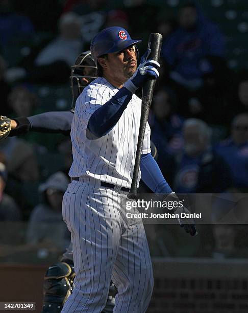 Geovany Soto of the Chicago Cubs reacts after striking out in the 9th inning against the Milwaukee Brewers at Wrigley Field on April 11, 2012 in...