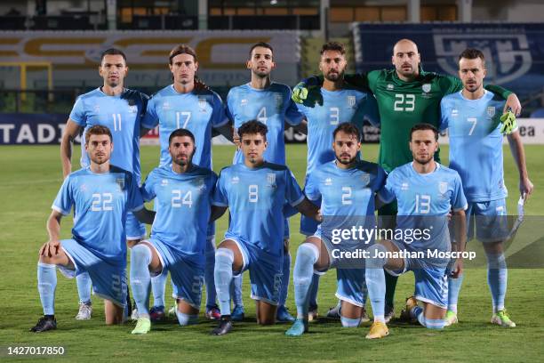 The San Marino starting eleven line up for a team photo prior to kick off, back row ; Dante Rossi, Filippo Fabbri, Luca Ceccaroli, Mirko Palazzi,...