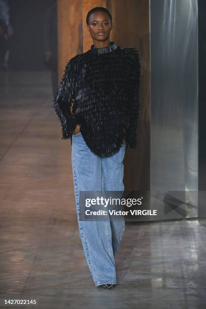 Model walks the runway during the Bally Ready to Wear Spring/Summer 2023 fashion show as part of the Milan Fashion Week on September 24, 2022 in...