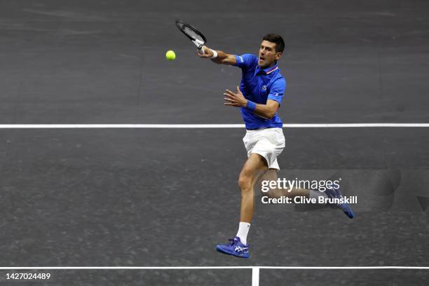 Novak Djokovic of Team Europe plays a forehand shot in the match between Alex De Minaur and Jack Sock of Team World and Novak Djokovic and Matteo...