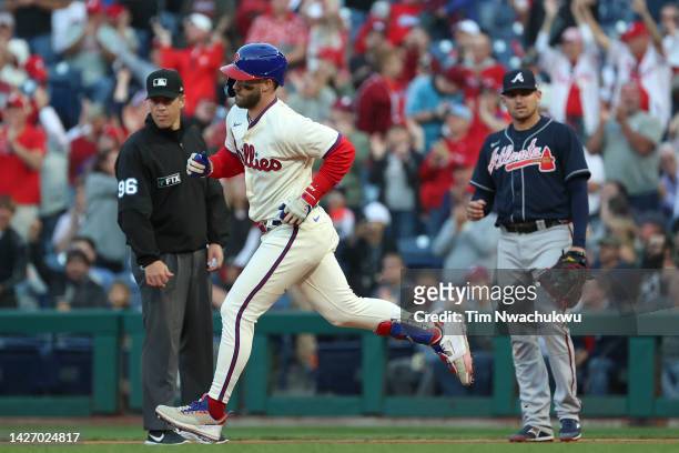 Bryce Harper of the Philadelphia Phillies rounds bases after hitting a two run home run during the sixth inning against the Atlanta Braves at...