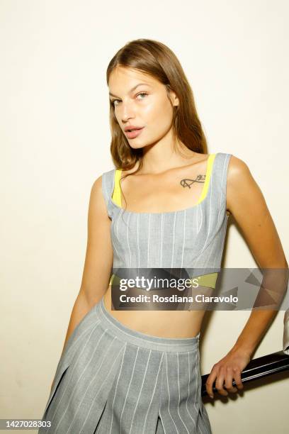 Faretta poses backstage at the Ermanno Scervino Fashion Show during the Milan Fashion Week Womenswear Spring/Summer 2023 on September 24, 2022 in...