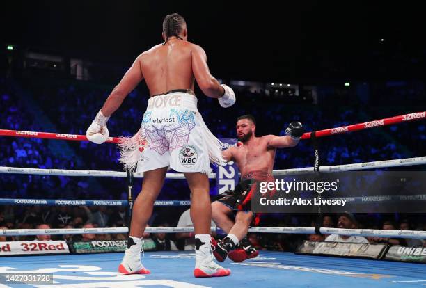 Joe Joyce knocks down Joseph Parker during the Vacant WBO Interim World Heavyweight Championship fight between Joe Joyce and Joseph Parker at AO...