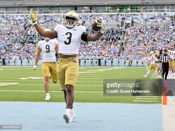 Logan Diggs of the Notre Dame Fighting Irish scores a touchdown against the North Carolina Tar Heels during the second half of their game at Kenan...