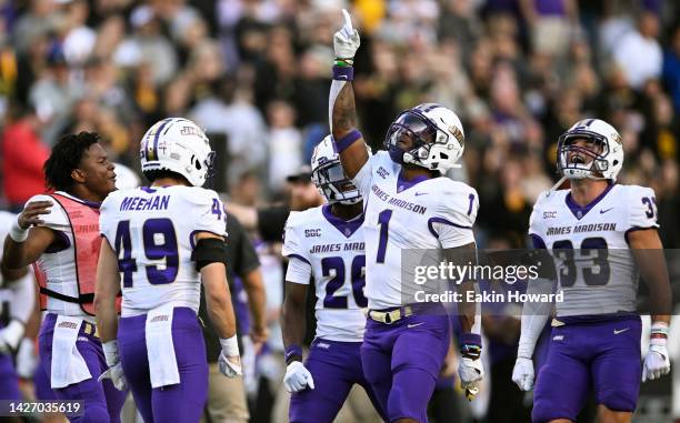 Que Reid of the James Madison Dukes celebrates after helping stop an Appalachian State Mountaineers 4th down in the fourth quarter at Kidd Brewer...