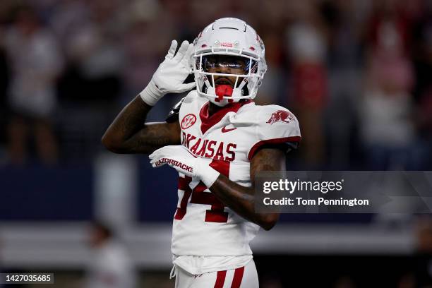 Wide receiver Warren Thompson of the Arkansas celebrates after scoring a touchdown against defensive back Myles Jones of the Texas A&M Aggies in the...