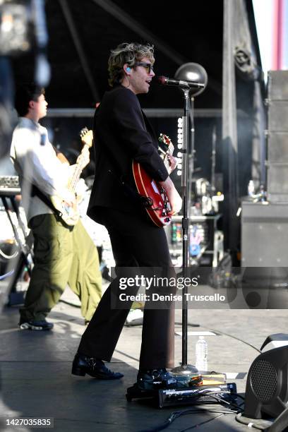 Calum Hood and Luke Hemmings of 5 Seconds of Summer perform onstage during the Daytime Stage at the 2022 iHeartRadio Music Festival held at AREA15 on...