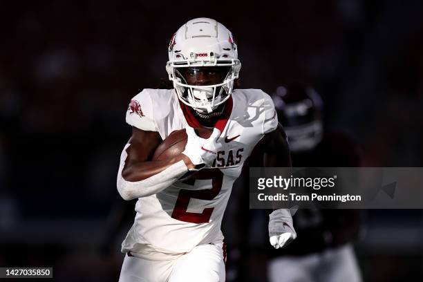 Wide receiver of the Arkansas Razorbacks scored a touchdown against the Texas A&M Aggies in the first quarter of the 2022 Southwest Classic at AT&T...