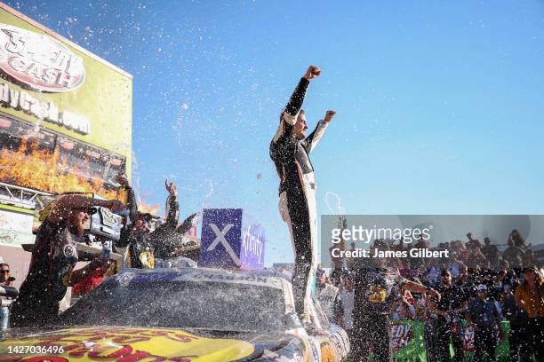 Noah Gragson, driver of the Bass Pro Shops/TrueTimber/BRCC Chevrolet, celebrates in victory lane after winning the NASCAR Xfinity Series Andy's...