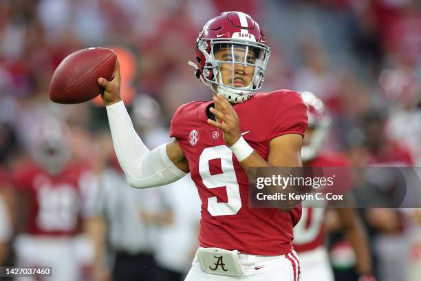 Bryce Young of the Alabama Crimson Tide throws a pass against the Vanderbilt Commodores during the first half of the game at Bryant-Denny Stadium on...