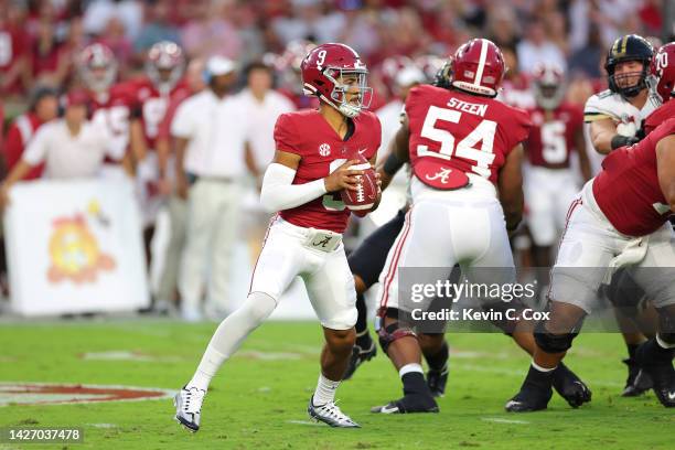 Bryce Young of the Alabama Crimson Tide looks to throw a pass against the Vanderbilt Commodores during the first half of the game at Bryant-Denny...