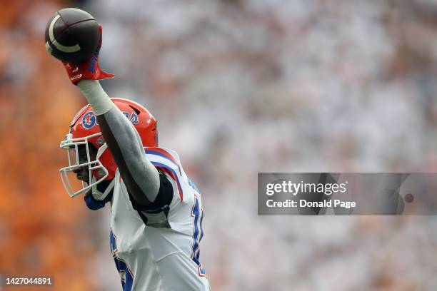 Tre'Vez Johnson of the Florida Gators picks up a ball against the Tennessee Volunteers at Neyland Stadium on September 24, 2022 in Knoxville,...