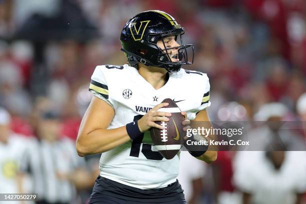 Swann of the Vanderbilt Commodores looks to pass against the Alabama Crimson Tide during the first half of the game at Bryant-Denny Stadium on...