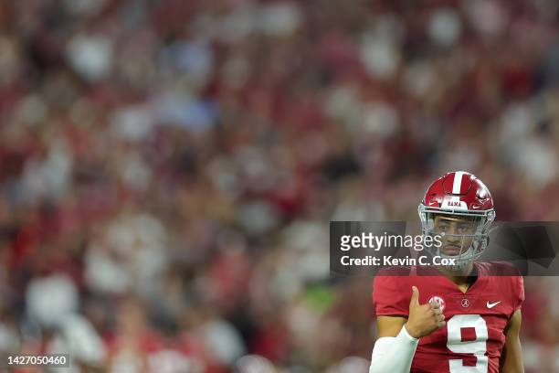 Bryce Young of the Alabama Crimson Tide signals a play against the Vanderbilt Commodores during the first half of the game at Bryant-Denny Stadium on...