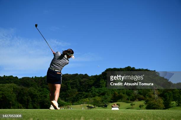 Kana Nagai of Japan hits her tee shot on the 4th hole during the final round of Miyagi TV Cup Dunlop Ladies Open at Rifu Golf Club Mihama Course on...