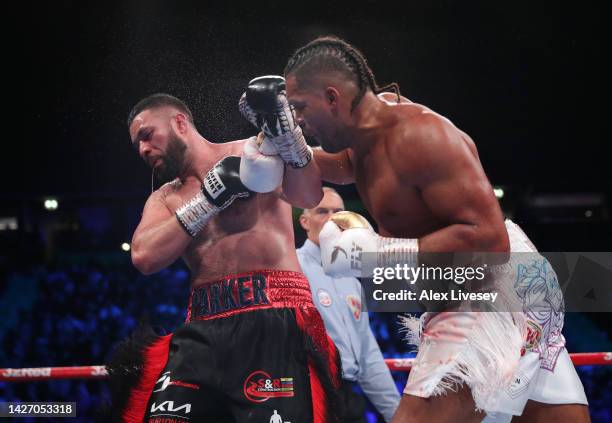 Joe Joyce punches Joseph Parker during the Vacant WBO Interim World Heavyweight Championship fight between Joe Joyce and Joseph Parker at AO Arena on...