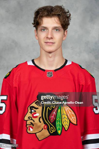 September 21: Kevin Korchinski of the Chicago Blackhawks poses for his official headshot for the 2022-2023 season on September 21, 2022 at the United...