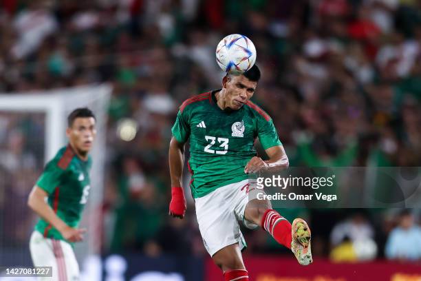 Jesus Gallardo of Mexico heads the ball during the friendly match between Mexico and Peru at Rose Bowl on September 24, 2022 in Pasadena, California.