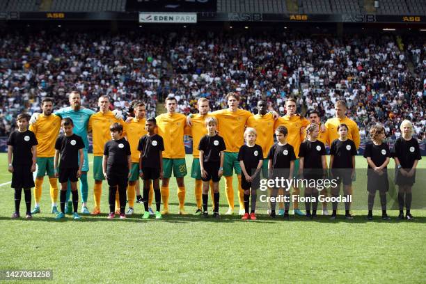 Australia sings the national anthem during the International friendly match between the New Zealand All Whites and Australia Socceroos at Eden Park...