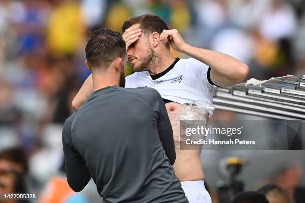 Chris Wood of the Whites receives medical assistance during the International Friendly match between the New Zealand All Whites and Australia...