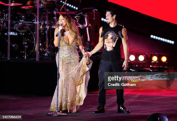 Mariah Carey, escorted by Bryan Tanaka, performs during the 2022 Global Citizen Festival in Central Park on September 24, 2022 in New York City.