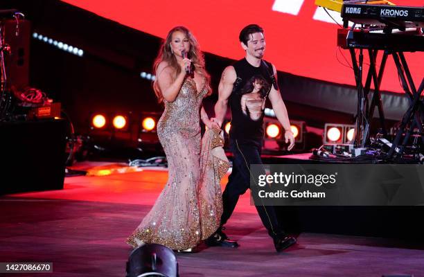 Mariah Carey, escorted by Bryan Tanaka, performs during the 2022 Global Citizen Festival in Central Park on September 24, 2022 in New York City.