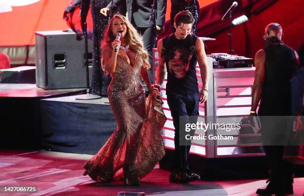 Mariah Carey, escorted by Bryan Tanaka, performs during the 2022 Global Citizen Festival in Central Park on September 24, 2022 in New York City.