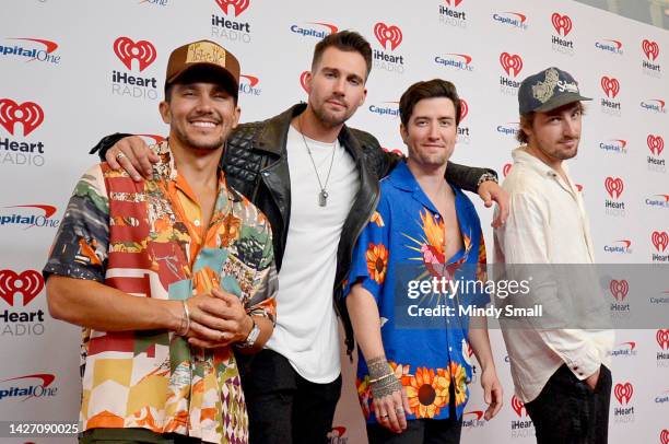 Carlos PenaVega, James Maslow, Logan Henderson, and Kendall Schmidt of Big Time Rush arrive at the 2022 iHeartRadio Music Festival at T-Mobile Arena...