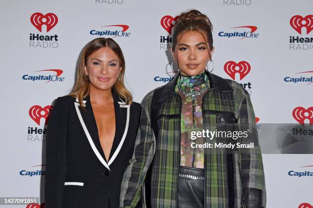 Becca Tilley and Hayley Kiyoko arrive at the 2022 iHeartRadio Music Festival at T-Mobile Arena on September 24, 2022 in Las Vegas, Nevada.