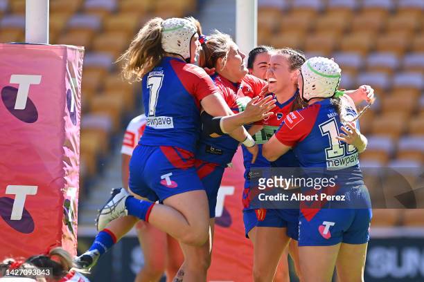 Knights celebrate a Tamika Upton try during the NRLW Semi Final match between the Newcastle Knights and the St George Illawarra Dragons at Suncorp...