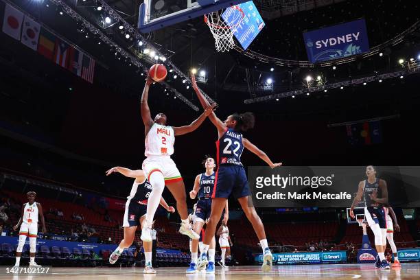 Salimatou Kourouma of Mali lays up as she is challenged by Marieme Badiane of France during the 2022 FIBA Women's Basketball World Cup Group B match...