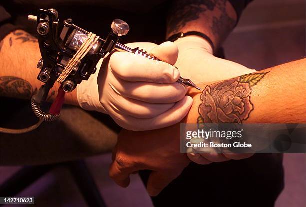 Tattoo artist and shop owner of The Purple Scorpion, Leo Murphy III... News  Photo - Getty Images