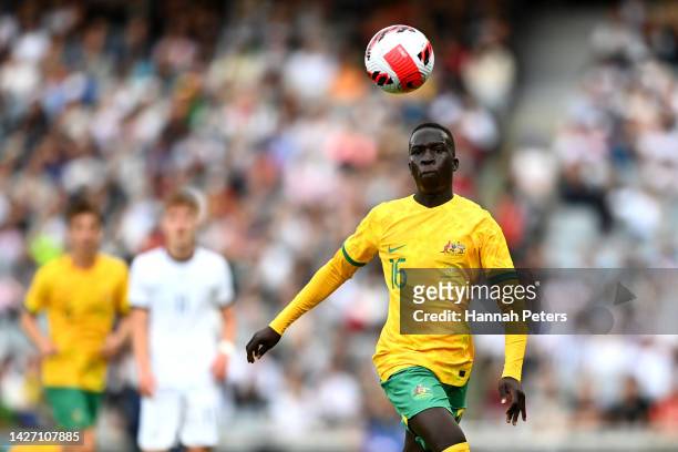 Garang Kuol of the Socceroos makes a break during the International Friendly match between the New Zealand All Whites and Australia Socceroos at Eden...