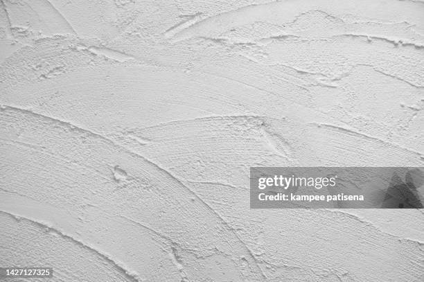 a background of a plain white color wall - gesso roccia foto e immagini stock