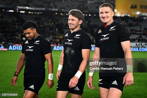 Richie Mo’unga, Beauden Barrett and Jordie Barrett of the All Blacks celebrate after winning The Rugby Championship and Bledisloe Cup match between...